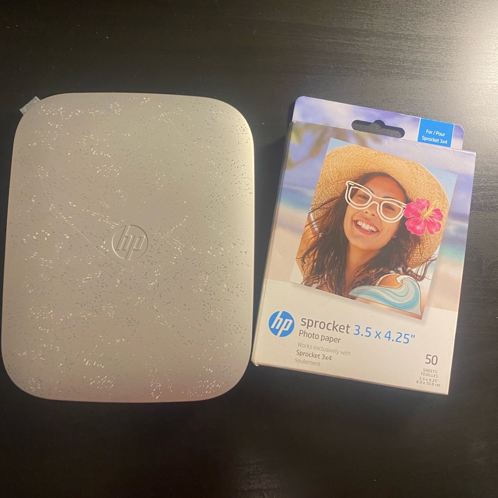 The HP Sprocket, portable photo printer - prints high-quality 2x3 inch photos.